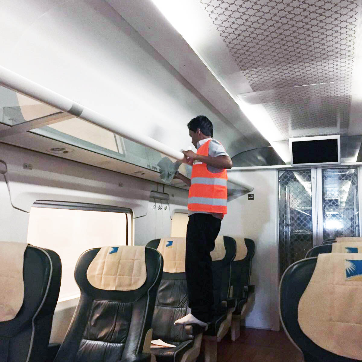 CAF Arabia Case Study, worker cleaning trains using facility management standards